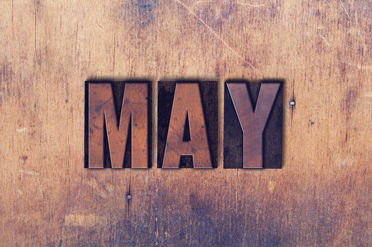 May Theme Letterpress Word on Wood Background