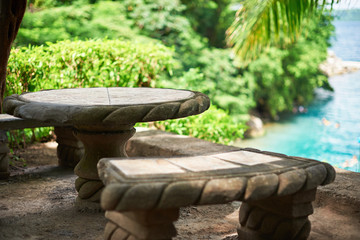 Wall Mural - Empty stone table on beach background