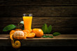 © DJ Creative Studio - Still Life Glass of Fresh Orange Juice on Vintage Wood Table with Copy Space Background