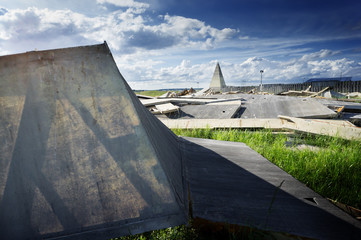 the wreckage of the pyramid in the Moscow region on the background of new small Pyramid, Russia