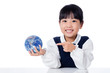 Leinwandbild Motiv Asian Little Chinese Girl Holding a World Globe