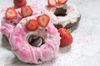 © azurita - Homemade baked chocolate donuns glazed with strawberry
