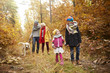 © gpointstudio - Family walk through forest path