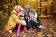 © gpointstudio - Cheerful scene of family in forest