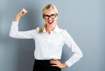 Sticker - Powerful young woman on a gray background