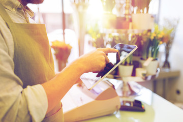 Canvas Print - close up of man with tablet pc at flower shop