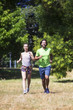 © BGStock72 - Young couple running in the park on a sunny day