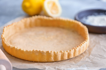 Wall Mural - Empty pie crust on table, closeup