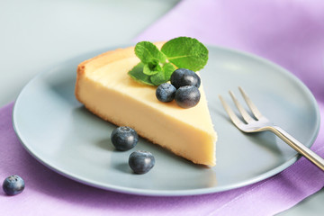 Sticker - Plate with cheesecake, berries and fork on violet napkin