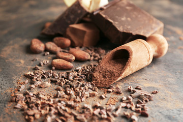 Wall Mural - Composition of cocoa products on table