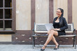 © KanyaphatStudio - Business woman sitting Working outdoor