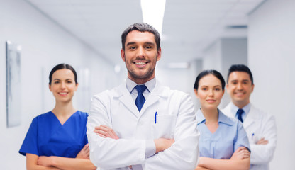 Sticker - happy group of medics or doctors at hospital