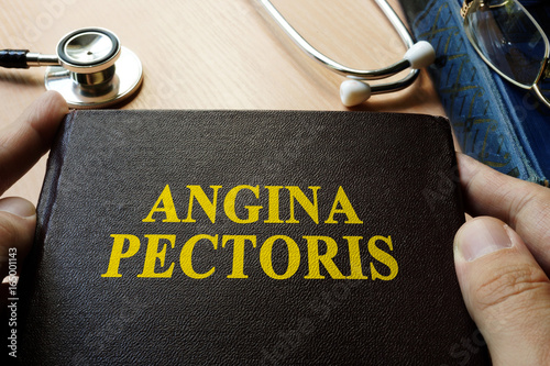 Title Angina pectoris on a book which holding doctor