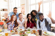 © Syda Productions - happy friends eating at restaurant