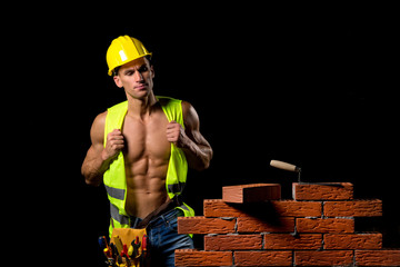 Wall Mural - fit shirtless worker with tools