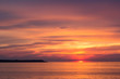 © Tomtsya - beautiful sunset sky over the baltic sea