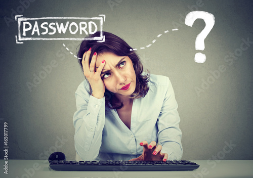 Cuadros en Lienzo Desperate woman trying to log into her computer forgot password