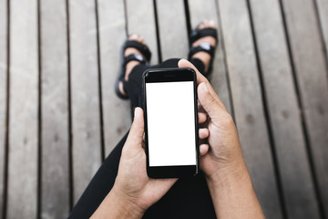 Aufkleber - woman sitting and using phone outdoor lifestyle