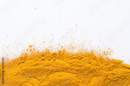 Fotografía Turmeric powder isolated on white background