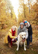 © gpointstudio - Smiley parents with son and dog