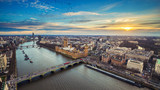 Fototapeta Big Ben - London, England - Aerial view of central London, with Big Ben, Houses of Parliament, Westminster Bridge, Lambeth Bridge at sunset with flying birds
