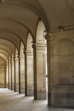 Gotic Stone Pillars And Arches With Carved Details
