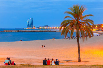 Fototapete - Barceloneta Beach in Barcelona during morning blue hour, Catalonia, Spain.