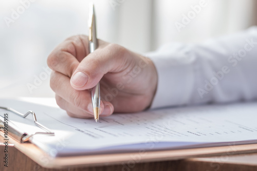 Cuadros en Lienzo Applicant filling in company application form HR human resource document applyin