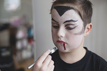 Getting Face Paint Applied For Halloween