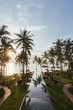 © Julien L. Balmer/Stocksy - Pool in Tropical Beach Resort