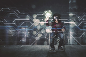 disabled man with vr headset and virtual screen
