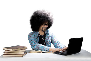 Wall Mural - Male student is using a headset