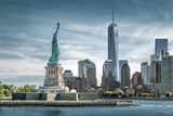 Fototapeta  - The Statue of Liberty with One World Trade Center background, Landmarks of New York City, USA