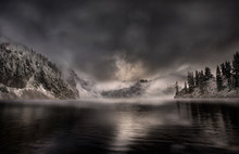 Moody Winter Scene At Snowy Lake