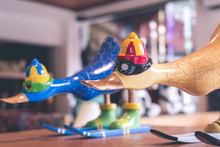Hancrafted And Hand Painted Funny Wooden Duck In Souvenir Shop On A Tropical Island Of Bali, Indonesia.