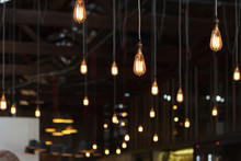 Light Bulbs Hanging With Dark Background