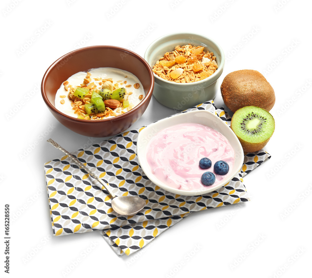 Tasty breakfast with yogurt on white background
