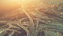 Aerial Drone Flight View Of Freeway Busy City Rush Hour Heavy Traffic Jam Highway. Top View. Cityscape In Sunset Soft Light. Instagram Vintage Filter Toning. Kiev, Capital Of Ukraine