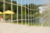 Fototapeta Sport - Tennis or volleyball net on a beach