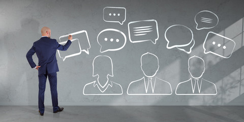 Wall Mural - businessman drawing discussion icons sketch on a wall 3d rendering