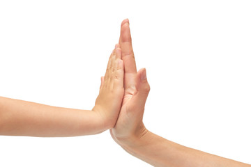 Wall Mural - hand of young girl and kids hand gesture, shows high five. Isolated on white background