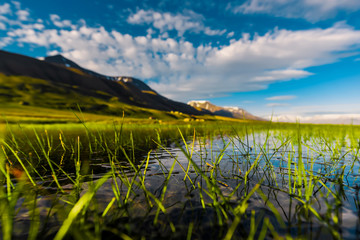 Wallpaper norway landscape nature of the mountains of Spitsbergen Longyearbyen Svalbard building city on a polar day with arctic summer in the sunset and blue sky with clouds