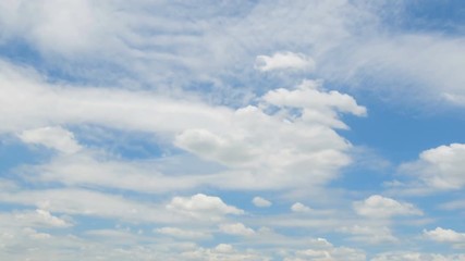 Wall Mural - beautiful fluffy white cloud flowing against blue sky.