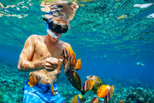 Happy Family Vacation - Man In Snorkeling Mask Dive Underwater With Tropical Fishes In Coral Reef Sea Pool. Travel Lifestyle, Water Sport Outdoor Adventure, Swimming Lessons On Summer Beach Holiday