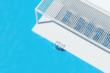 Wall Mural - Swimming pool with blue deck chairs, top view