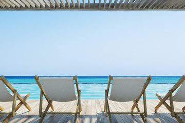 Wall Mural - Row of white chairs near a pool