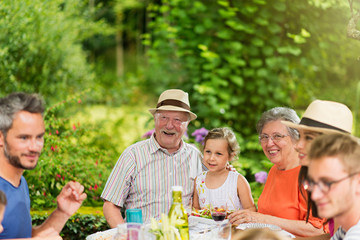 Poster - Lunch in the garden for multi-generation family