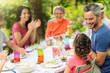© jackfrog - Multi-generation family having lunch in the garden