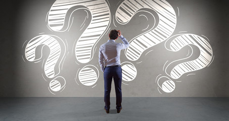 Poster - Businessman watching a question mark sketch on a wall 3D rendering