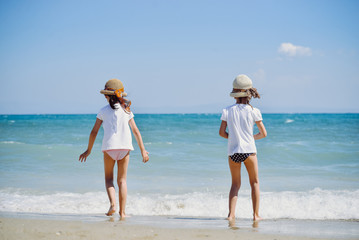 Cute little girls on the beach